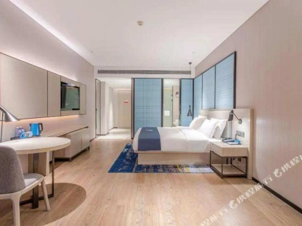 Bed in Echarm Hotel Fangchenggang Qisha