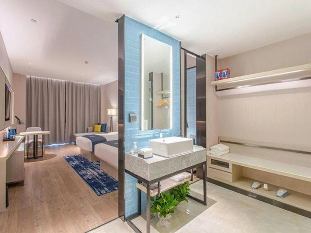 Bed in Echarm Hotel Fangchenggang Qisha