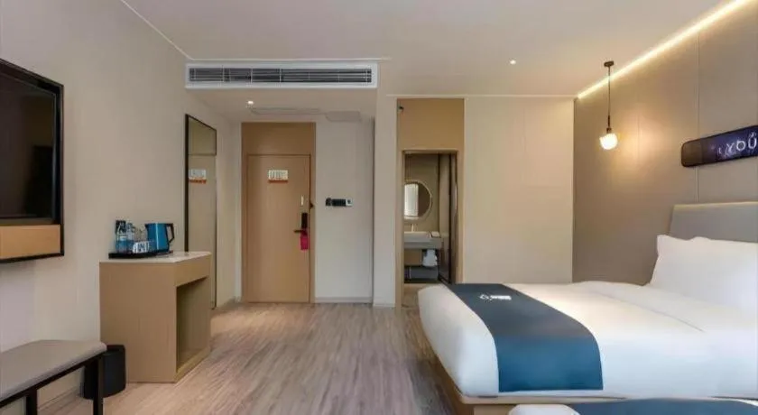 Bed in Echarm Hotel Shanghai North Bund Tilanqiao Metro Station