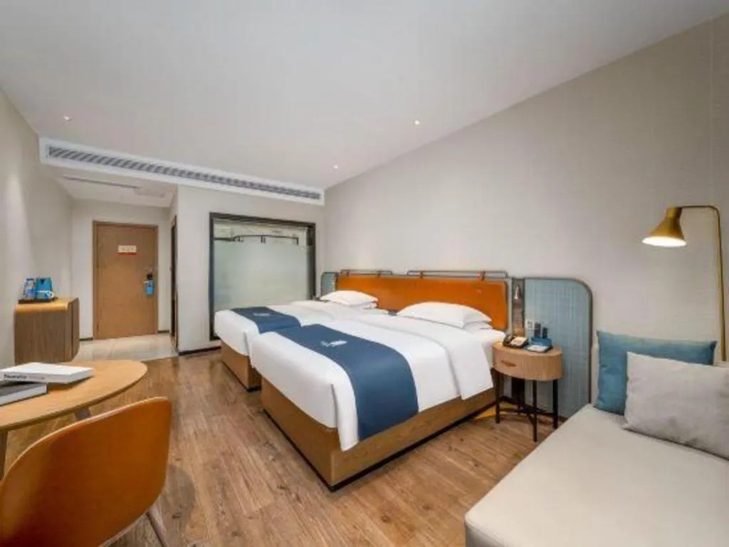 Bed in Echarm Hotel Liuzhou Yaobu Ancient Town