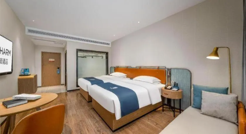 Bed in Echarm Hotel Liuzhou Yaobu Ancient Town