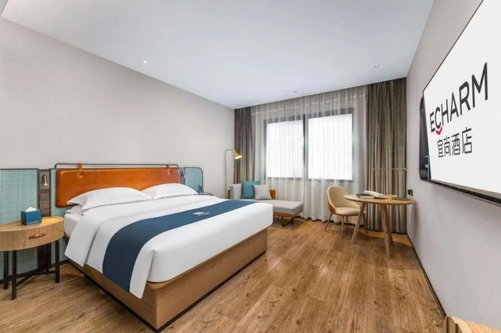 Bed in Echarm Hotel Liuzhou Yaobu Ancient Town