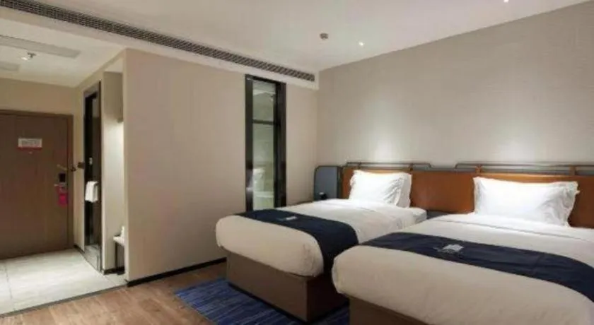 Bed in Echarm Hotel Liuzhou Yaobu Ancient Town