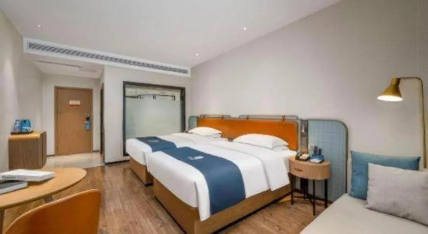 Bed in Echarm Hotel Liuzhou Yaobu Ancient Town