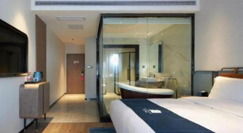 Bed in Echarm Hotel Liuzhou Yaobu Ancient Town