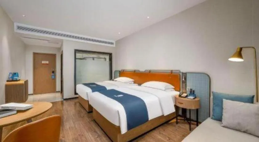 Bed in Echarm Hotel Liuzhou Yaobu Ancient Town