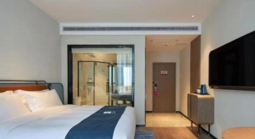 Bed in Echarm Hotel Liuzhou Yaobu Ancient Town