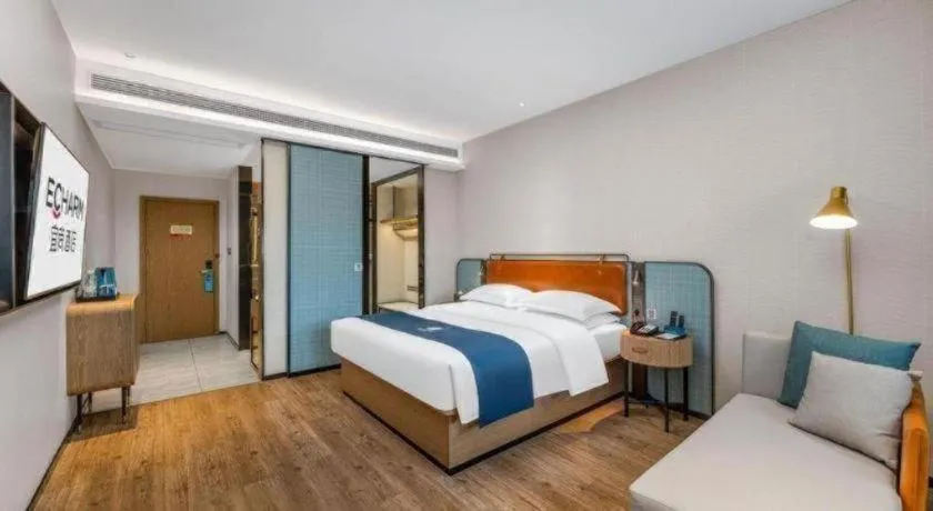 Bed in Echarm Hotel Liuzhou Yaobu Ancient Town