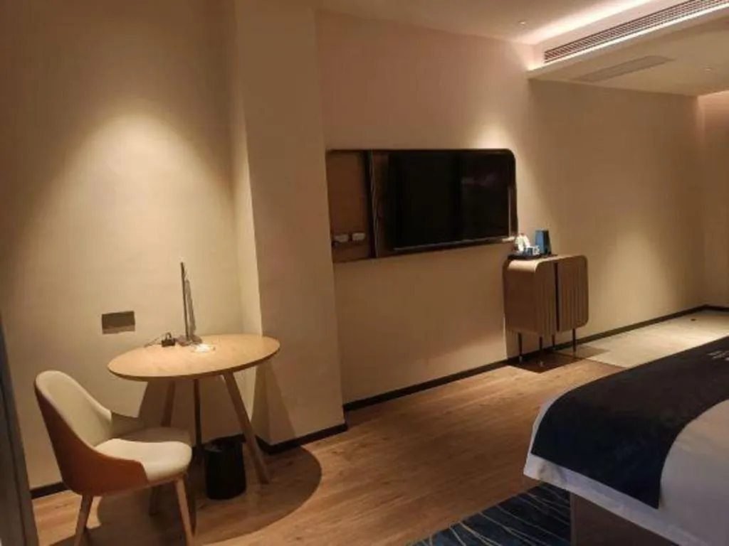 Bed in Echarm Hotel Liuzhou Yaobu Ancient Town