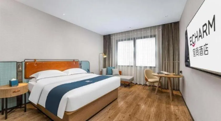 Bed in Echarm Hotel Liuzhou Yaobu Ancient Town