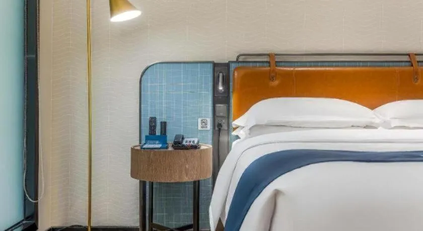 Bed in Echarm Hotel Liuzhou Yaobu Ancient Town