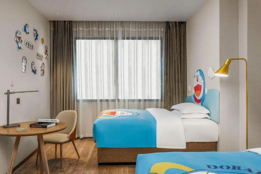 Bed in Echarm Hotel Liuzhou Yaobu Ancient Town