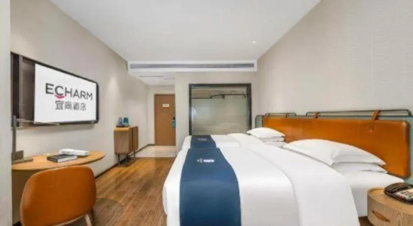 Bed in Echarm Hotel Liuzhou Yaobu Ancient Town