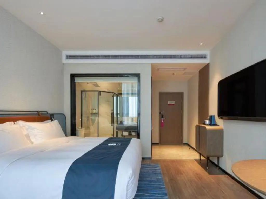 Bed in Echarm Hotel Liuzhou Yaobu Ancient Town