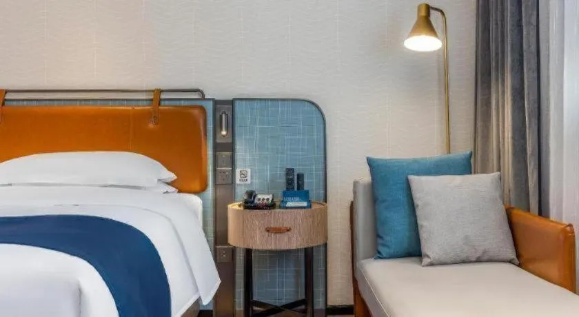 Bed in Echarm Hotel Liuzhou Yaobu Ancient Town