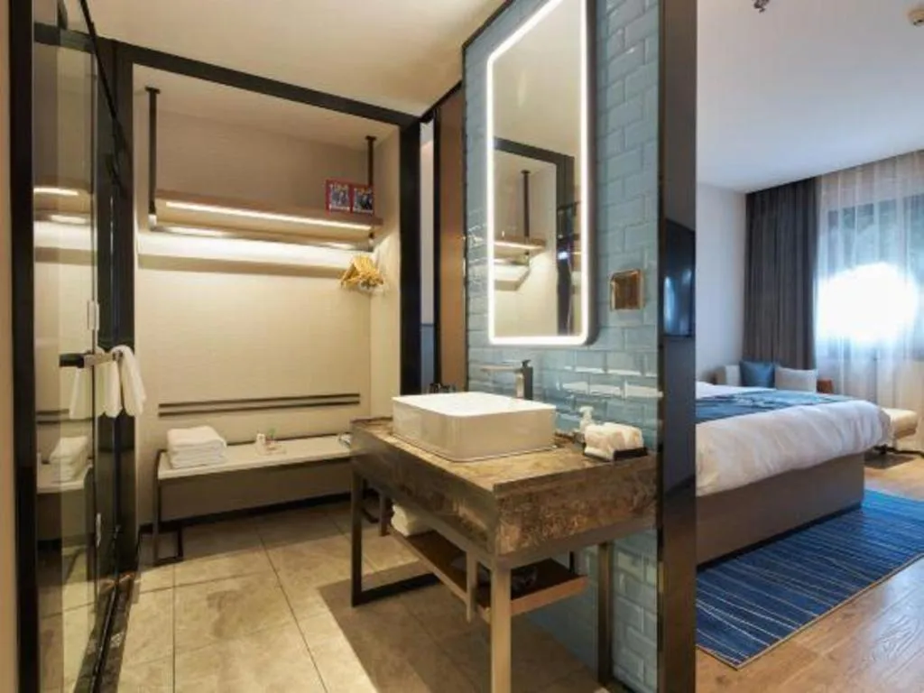 Bed in Echarm Hotel Liuzhou Yaobu Ancient Town