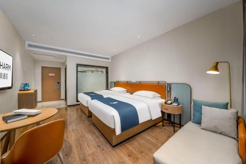 Bed in Echarm Hotel Liuzhou Yaobu Ancient Town