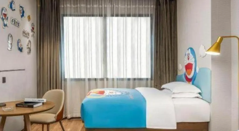 Bed in Echarm Hotel Liuzhou Yaobu Ancient Town