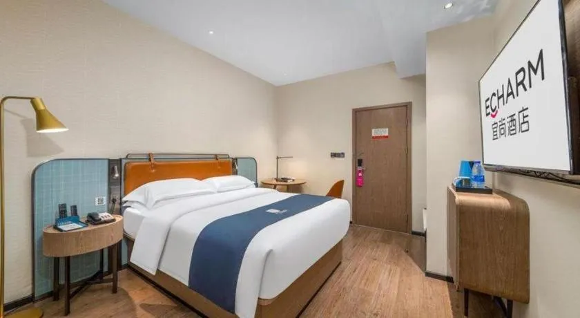 Bed in Echarm Hotel Liuzhou Yaobu Ancient Town