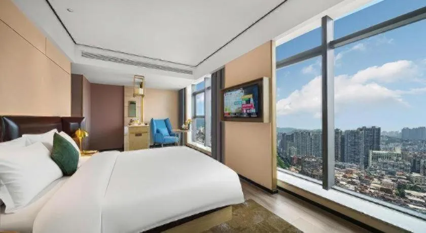 Bed in Premier City Comfort Hotel Quanzhou Wanda Plaza