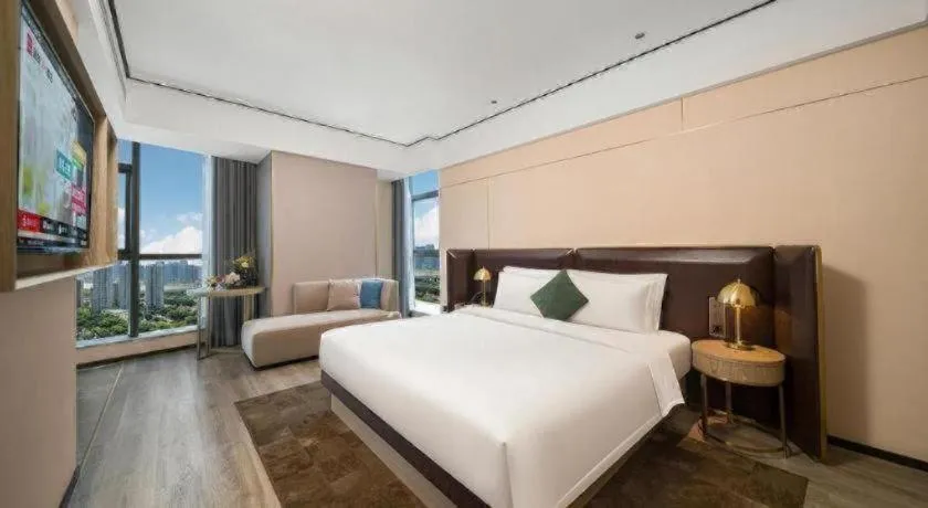 Bed in Premier City Comfort Hotel Quanzhou Wanda Plaza