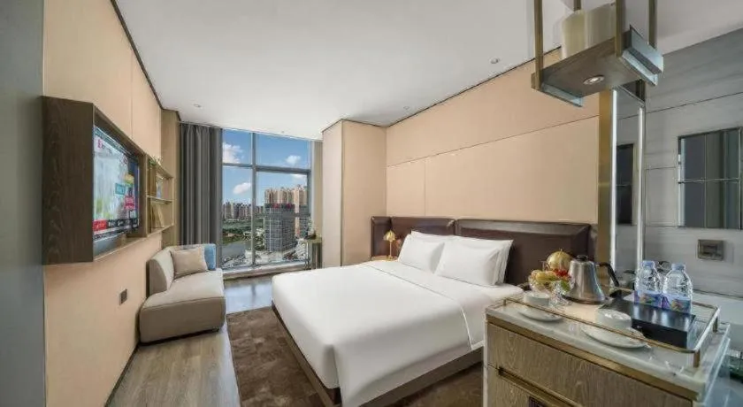 Bed in Premier City Comfort Hotel Quanzhou Wanda Plaza