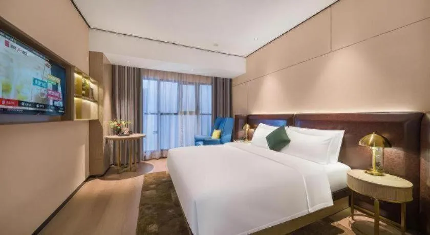 Bed in Premier City Comfort Hotel Quanzhou Wanda Plaza