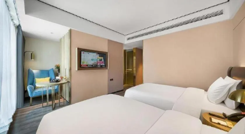 Bed in Premier City Comfort Hotel Quanzhou Wanda Plaza
