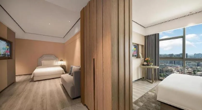 Bed in Premier City Comfort Hotel Quanzhou Wanda Plaza