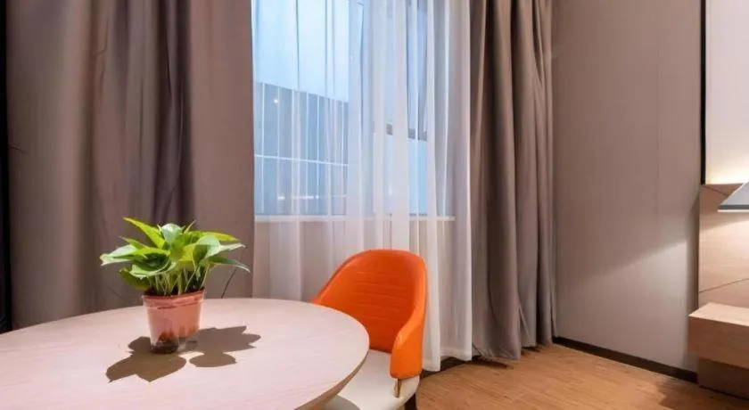 Bed in Borrman Hotel Zhonghsan Guzheng Huayi Plaza Light Rail Station