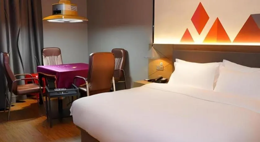 Bed in Borrman Hotel Zhonghsan Guzheng Huayi Plaza Light Rail Station