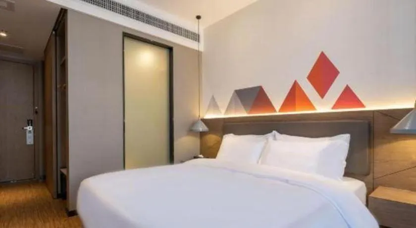 Bed in Borrman Hotel Zhonghsan Guzheng Huayi Plaza Light Rail Station