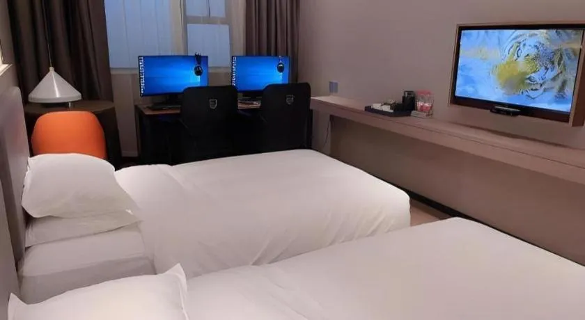 Bed in Borrman Hotel Zhonghsan Guzheng Huayi Plaza Light Rail Station