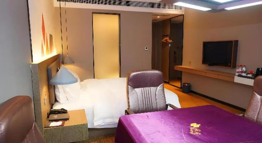 Bed in Borrman Hotel Zhonghsan Guzheng Huayi Plaza Light Rail Station