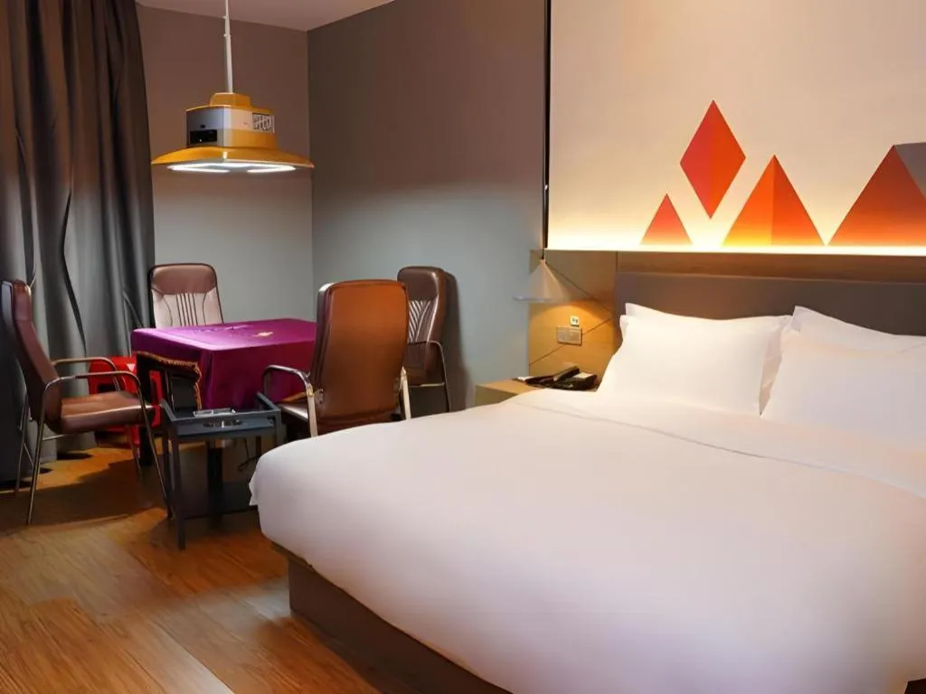 Bed in Borrman Hotel Zhonghsan Guzheng Huayi Plaza Light Rail Station