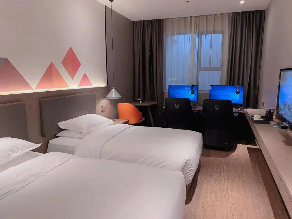 Bed in Borrman Hotel Zhonghsan Guzheng Huayi Plaza Light Rail Station