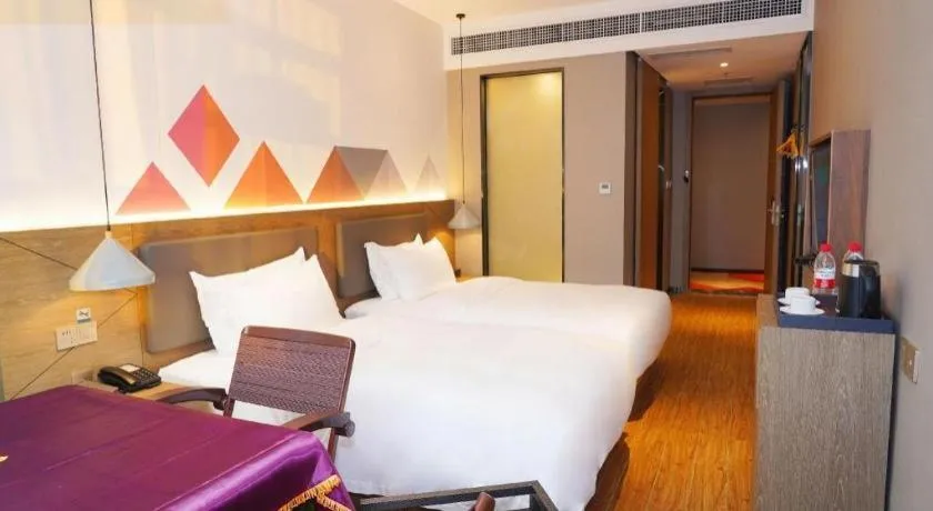 Bed in Borrman Hotel Zhonghsan Guzheng Huayi Plaza Light Rail Station