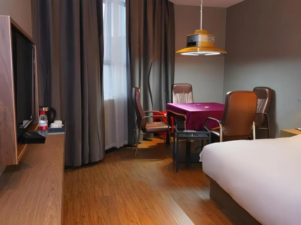 Bed in Borrman Hotel Zhonghsan Guzheng Huayi Plaza Light Rail Station