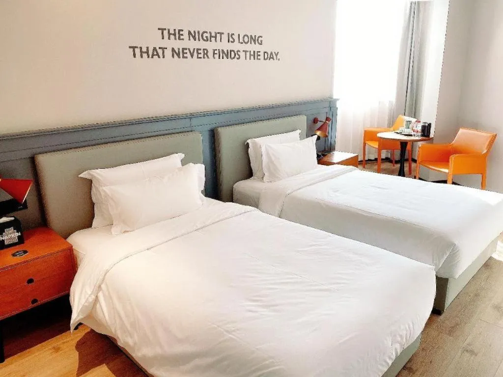 Bed in Premier City Comfort Hotel Wuhan Yellow Crane Shouyi Road Metro Station