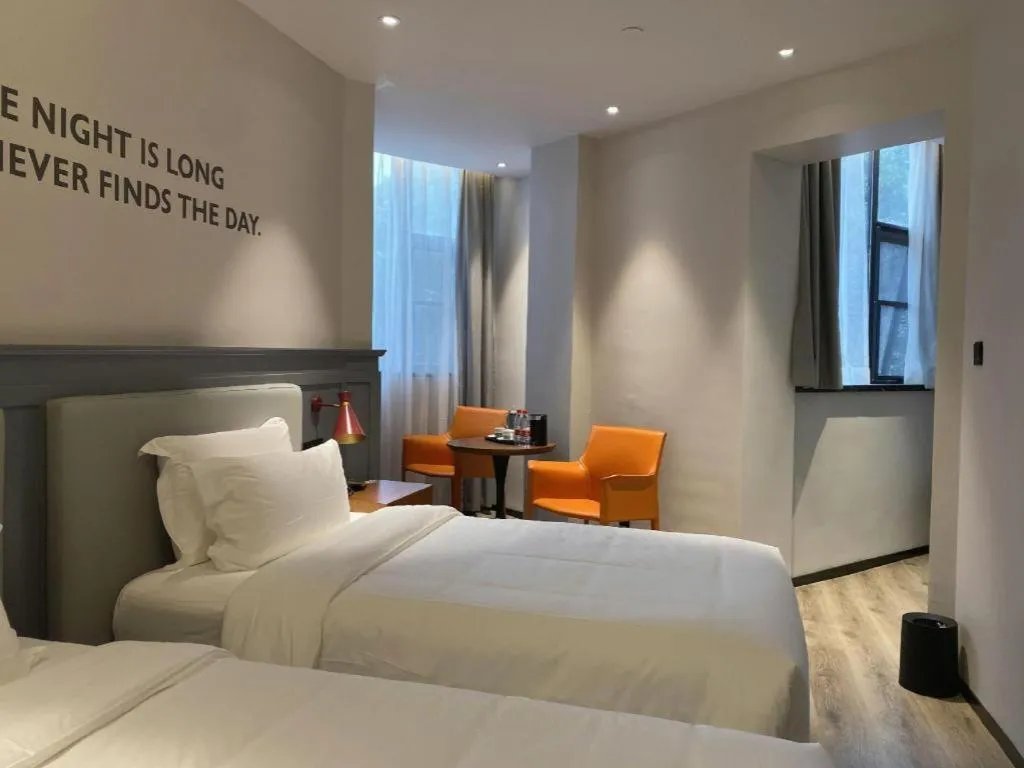 Bed in Premier City Comfort Hotel Wuhan Yellow Crane Shouyi Road Metro Station