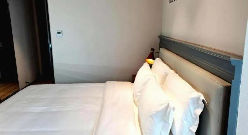 Bed in Premier City Comfort Hotel Wuhan Yellow Crane Shouyi Road Metro Station