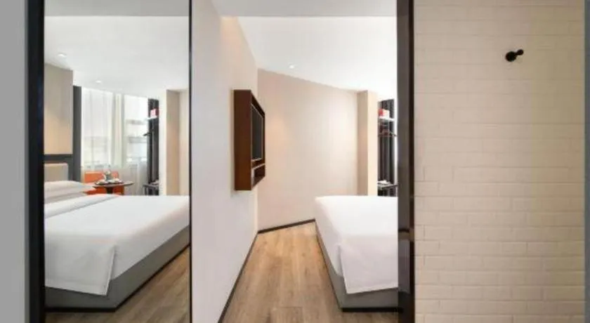 Bed in Premier City Comfort Hotel Wuhan Yellow Crane Shouyi Road Metro Station