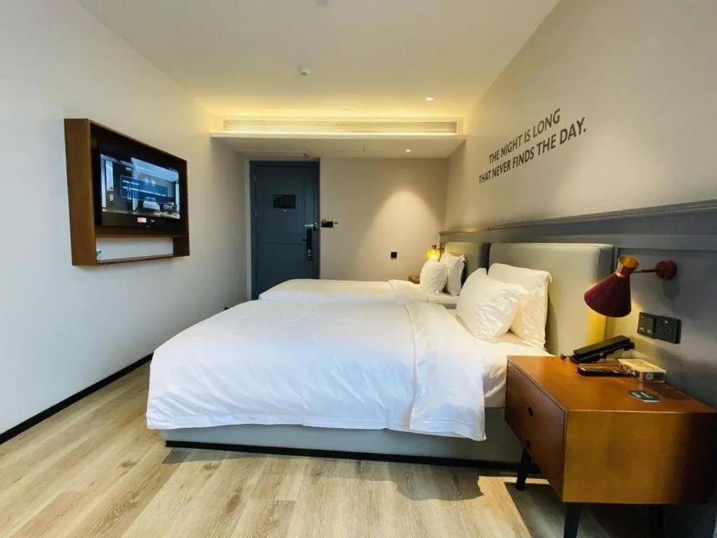 Bed in Premier City Comfort Hotel Wuhan Yellow Crane Shouyi Road Metro Station