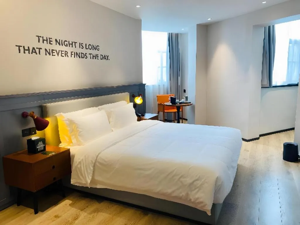 Bed in Premier City Comfort Hotel Wuhan Yellow Crane Shouyi Road Metro Station