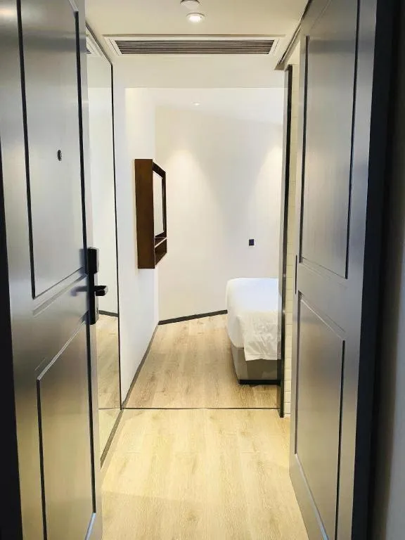 Bed in Premier City Comfort Hotel Wuhan Yellow Crane Shouyi Road Metro Station