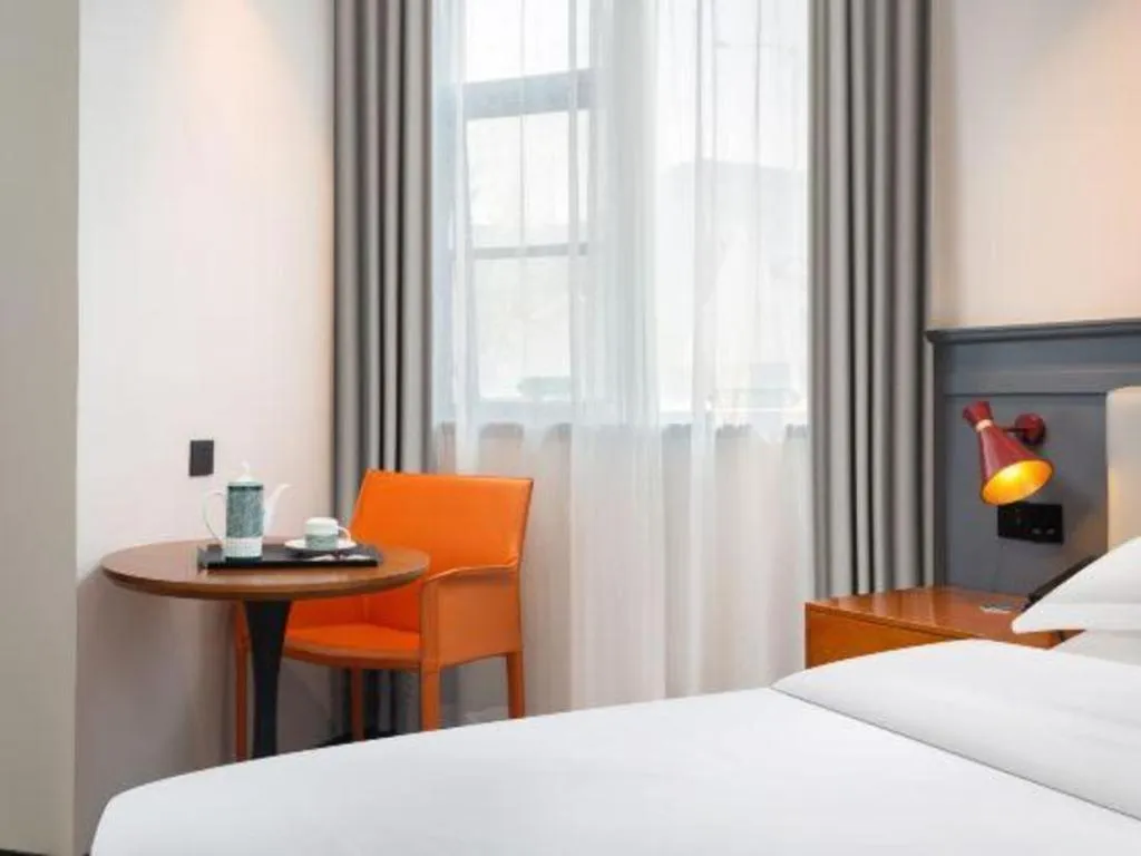 Bed in Premier City Comfort Hotel Wuhan Yellow Crane Shouyi Road Metro Station