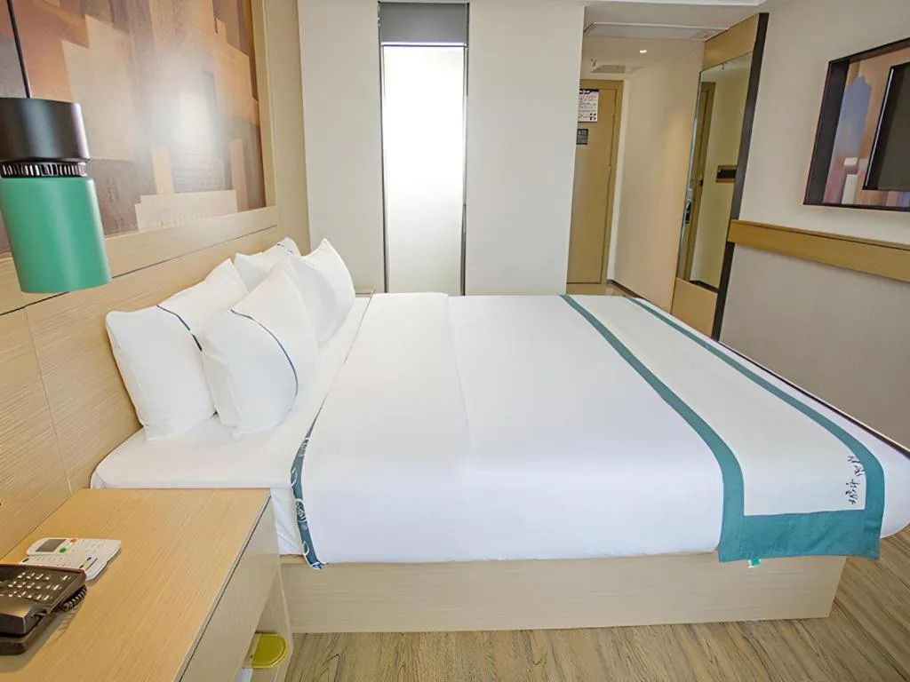 Bed in City Comfort Inn Yangxin High-speed Railway Station