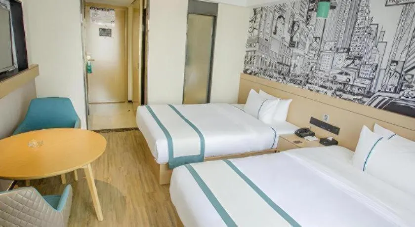 Bed in City Comfort Inn Yangxin High-speed Railway Station