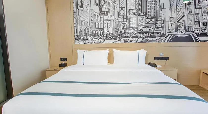 Bed in City Comfort Inn Yangxin High-speed Railway Station