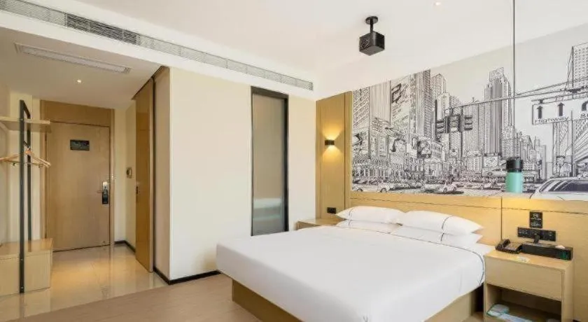 Bed in City Comfort Inn Jiyuan Jishui Avenue Jigang